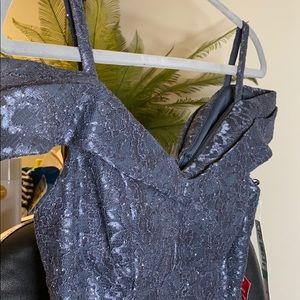 Long beautiful sparkling dark blue dress.